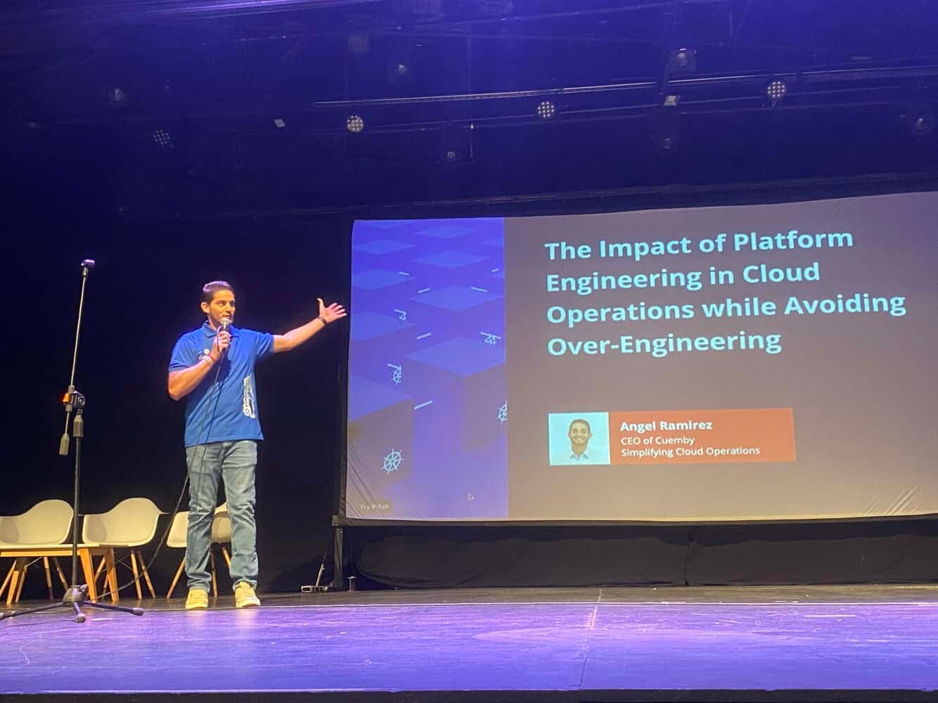 Angel Ramirez speaking on the stage for The Impact of Platform Engineering in Cloud Operations while avoiding over-engineering