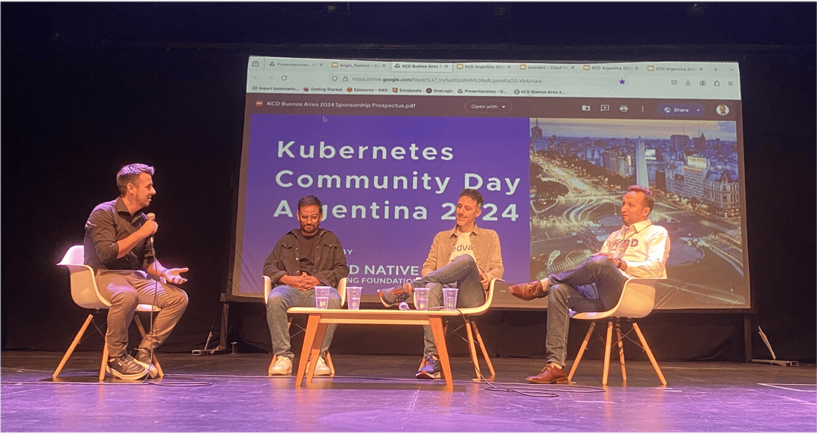 Four speakers on stage for Kubernetes Community Day Argentina 2024