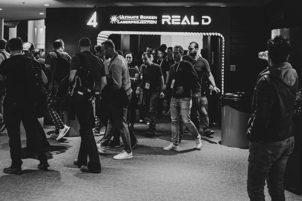 Participants walking on the event floor